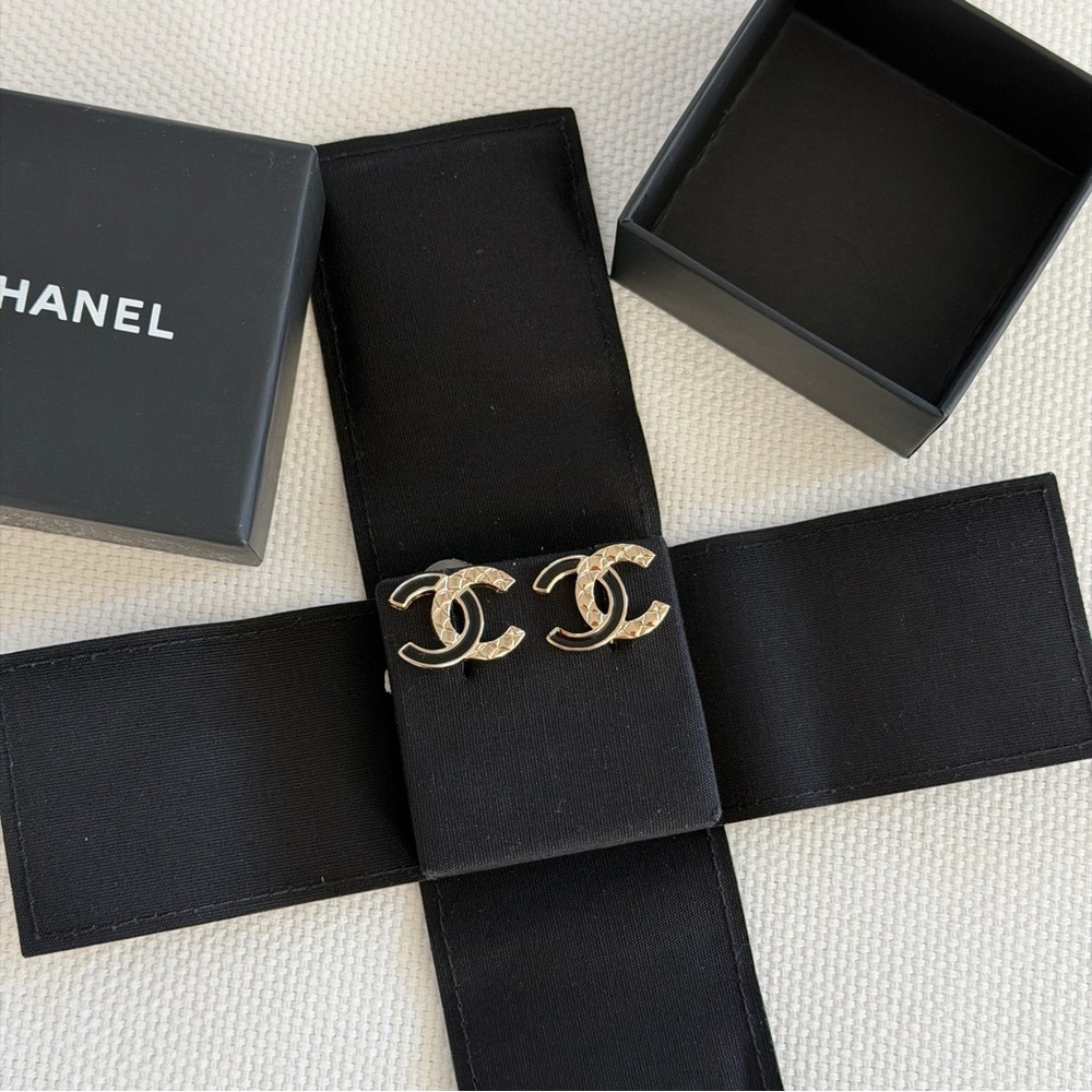 CHANEL Gold Logo Stud Earrings
